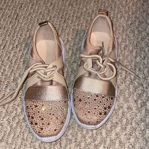 Beautiful rose gold sneakers.